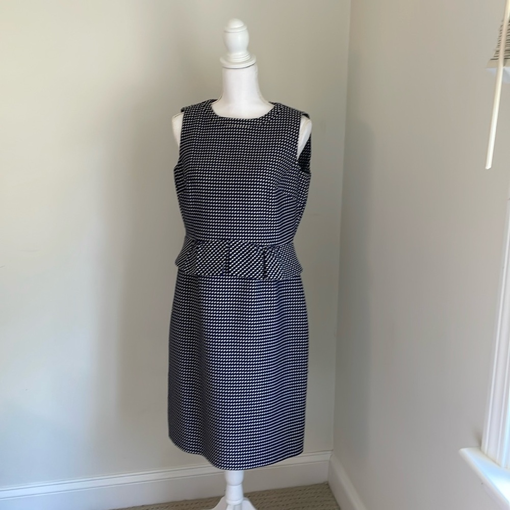 Navy blue and white Tahari tailored dress.

Navy sweater not included